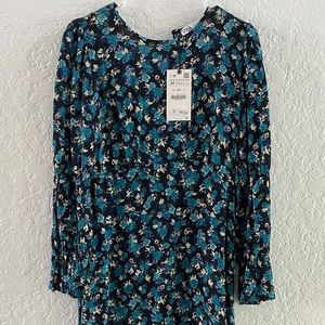 Long sleeve calf length dress. Never worn.